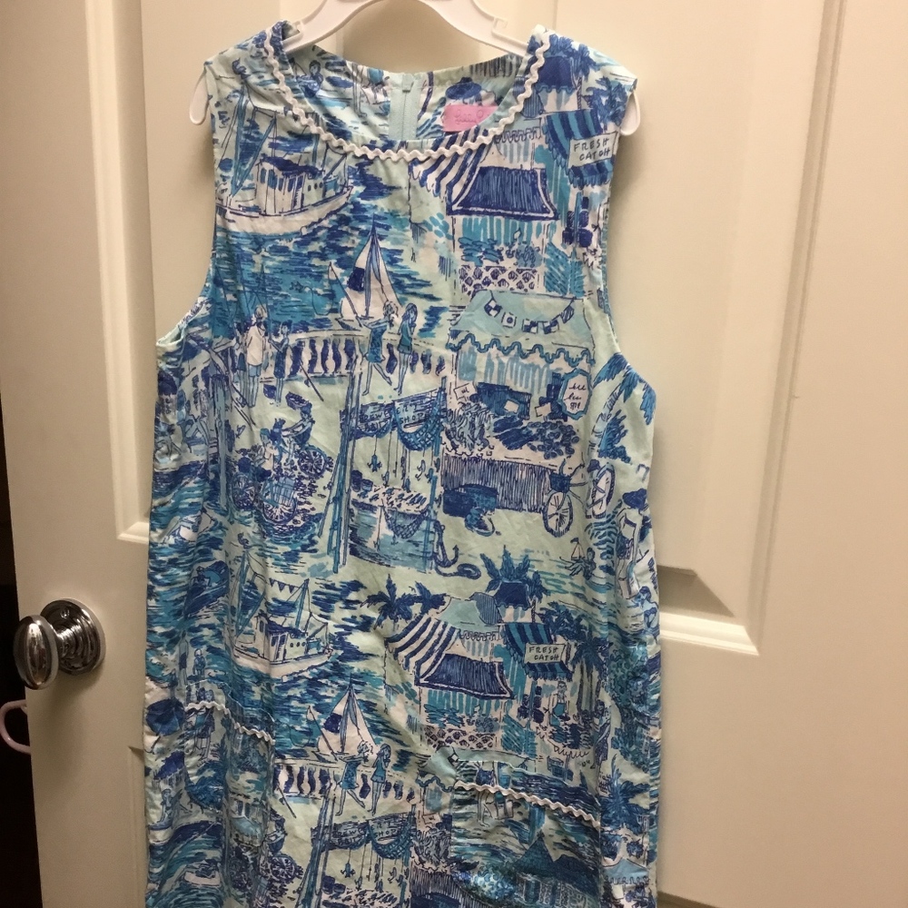 A blue, detailed lily pulitzer dress.
